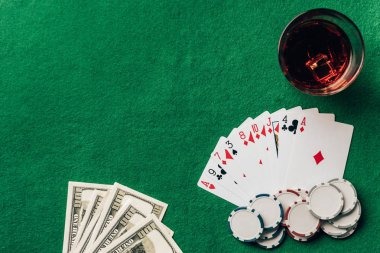 Close-up of live dealer dealing cards at a baccarat table on bigo4d
